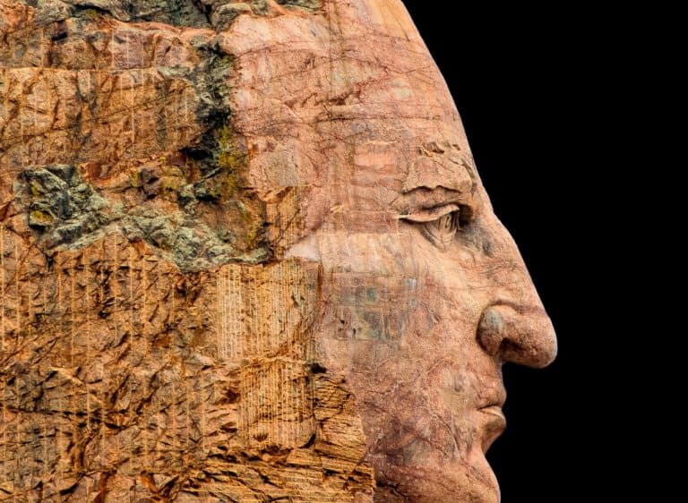 Rock art of a mans face facing right