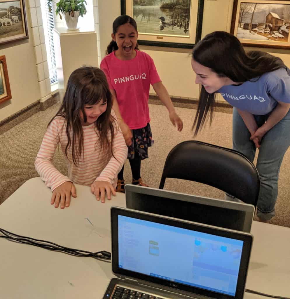 emily teaching two female students