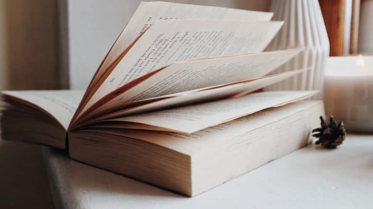 A book open on a table.
