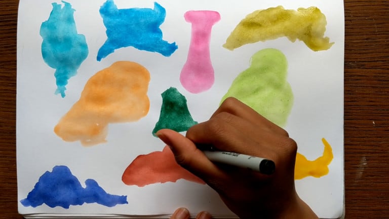 Painting blob art characters.