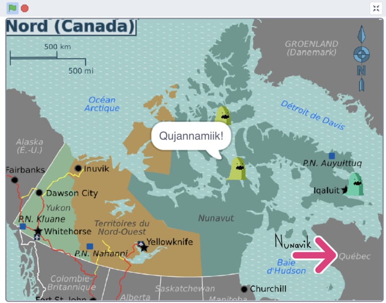 Critter on a map of Nunavut saying "Qujannamiik!"