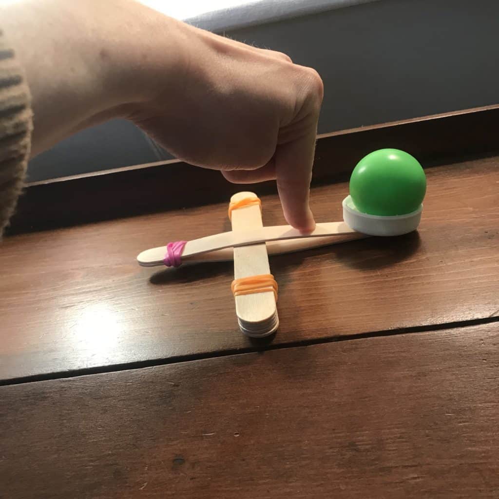 Step five of the catapult maker activity project.