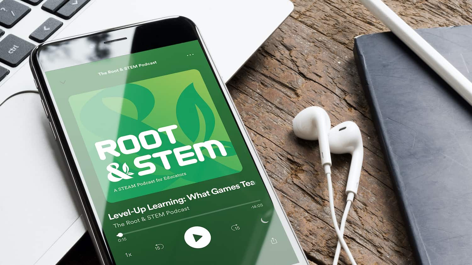 Smart phone with a set of headphones displaying "Root & STEM podcast" cover art.