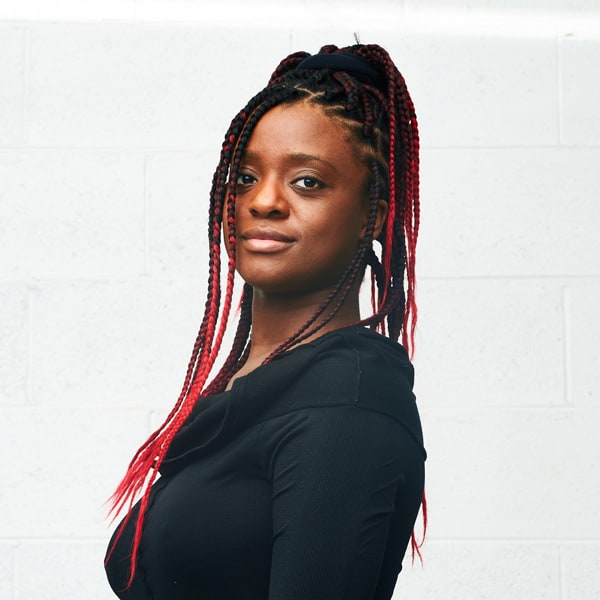 A portrait of Nia Emmanuel-Briggs