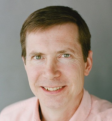 A portrait of Lawrence Reeves.
