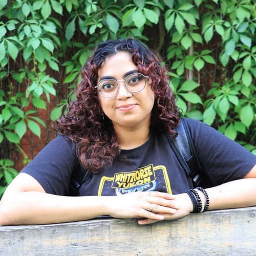 A portrait of MEral Jamal.